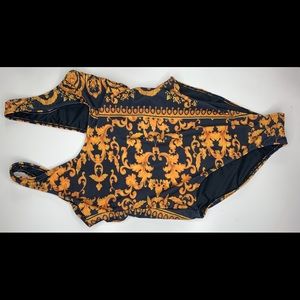 Black and gold pattern one piece swimsuit
